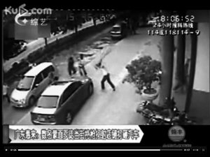 10余蒙面男子因产妇死亡持枪扫射办公楼(图)