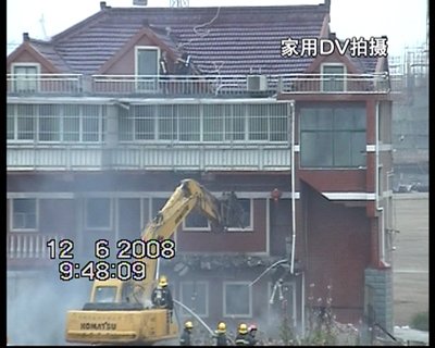 上海钉子户事件折射物权法与拆迁条例博弈