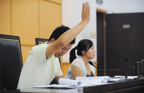限价房资格被撤 小夫妻告住建委(图)